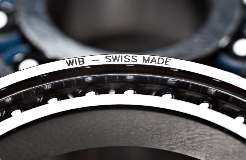A ball bearing with WIB - SWISS MADE branding